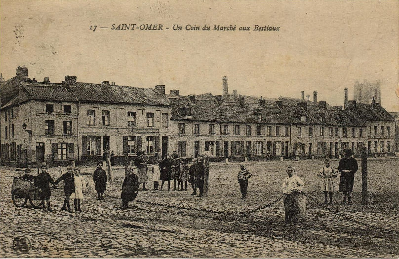 (e)- Un coin de la place