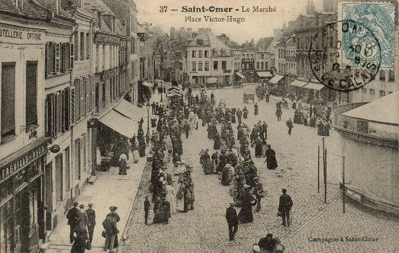 (e)- La place un jour de marché